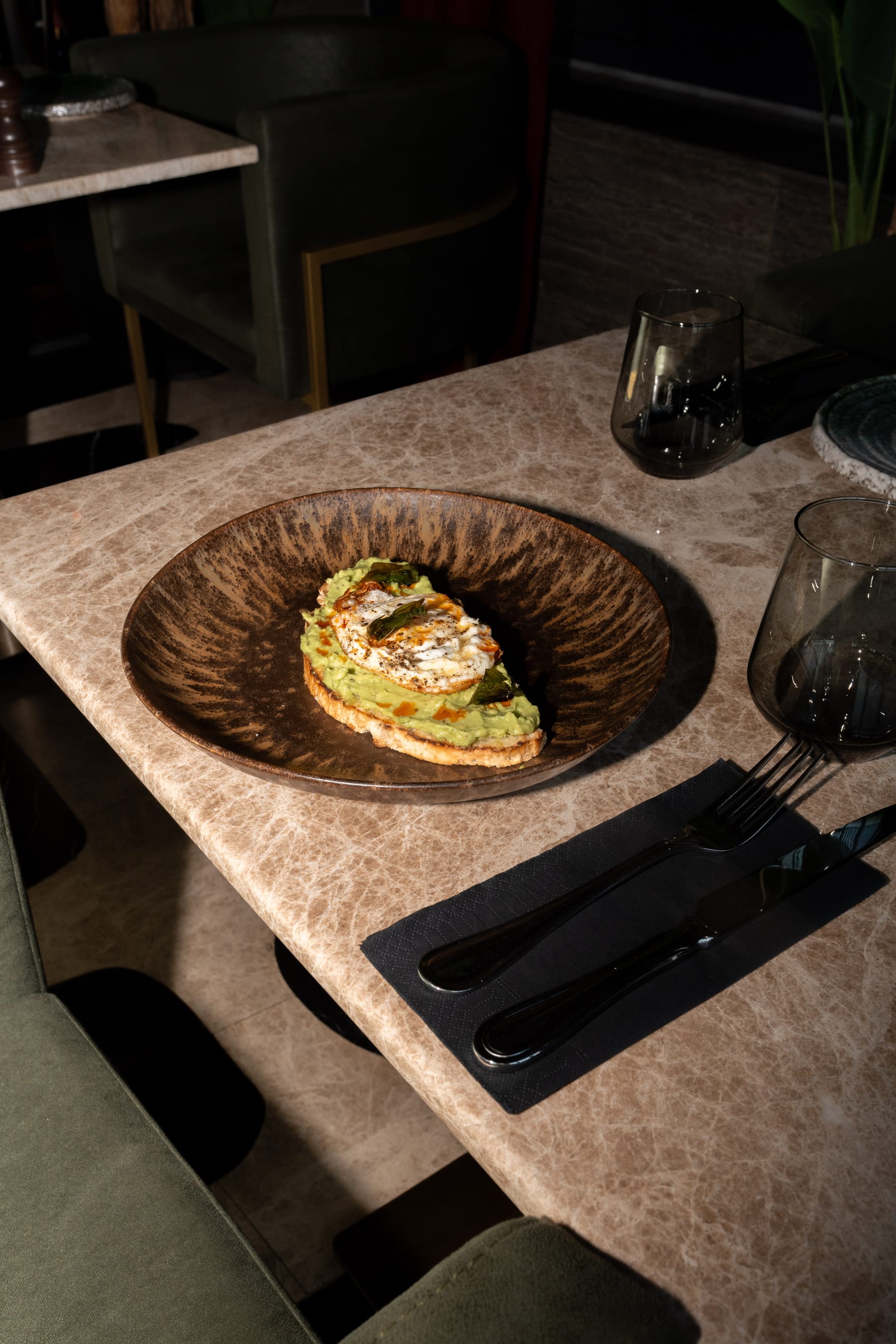 Avocado toast with a fried egg served at OCCO Business Bay