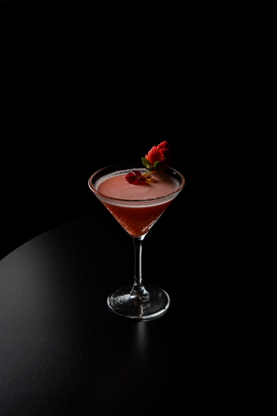 Love Spritz signature cocktail at OCCO Business Bay Dubai — pink strawberry and rose cocktail in a coupe glass