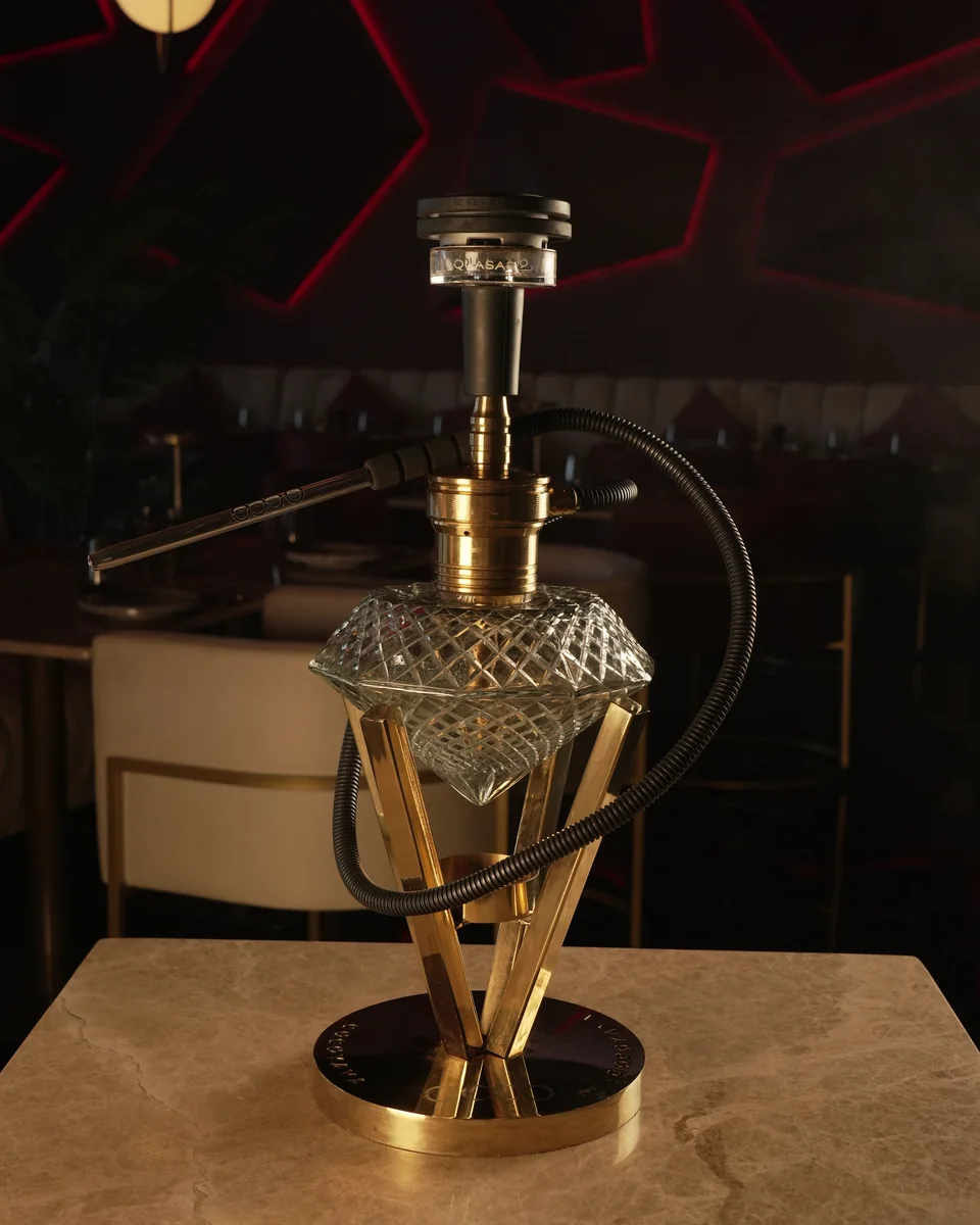 A crystal-base shisha on a marble table at OCCO Hessa